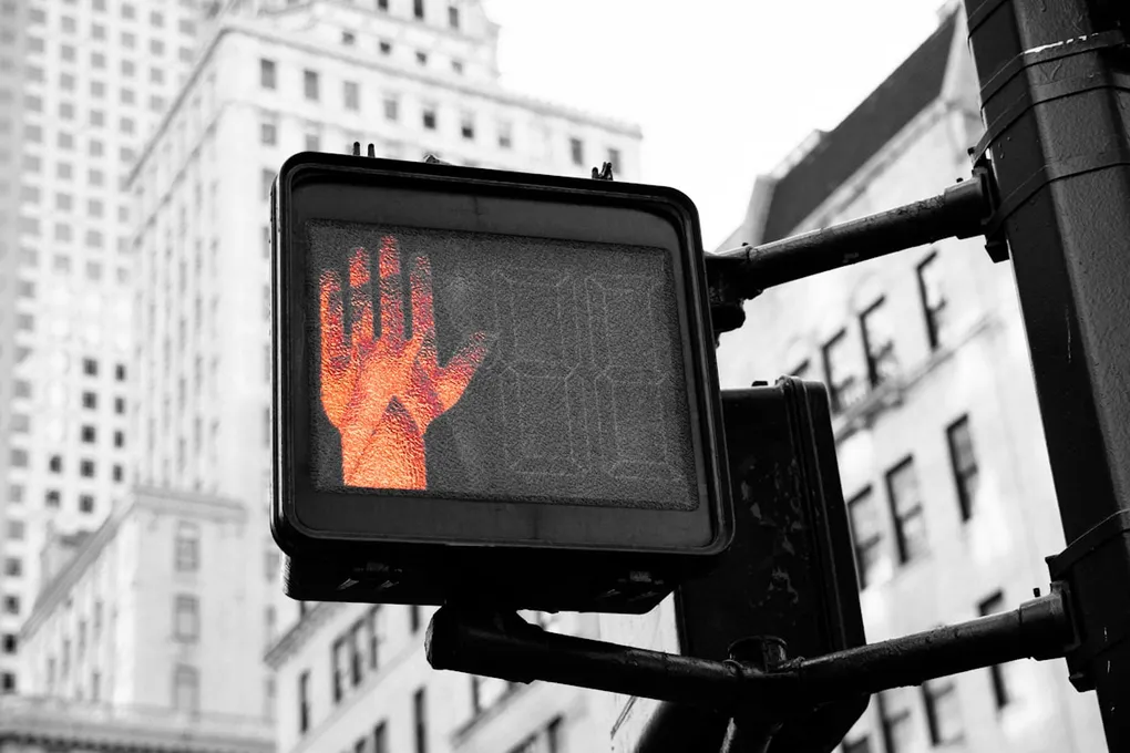 Stop hand signal on pedestrian traffic light