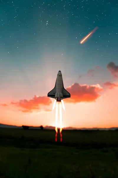 Rocket launching into the sky during daytime
